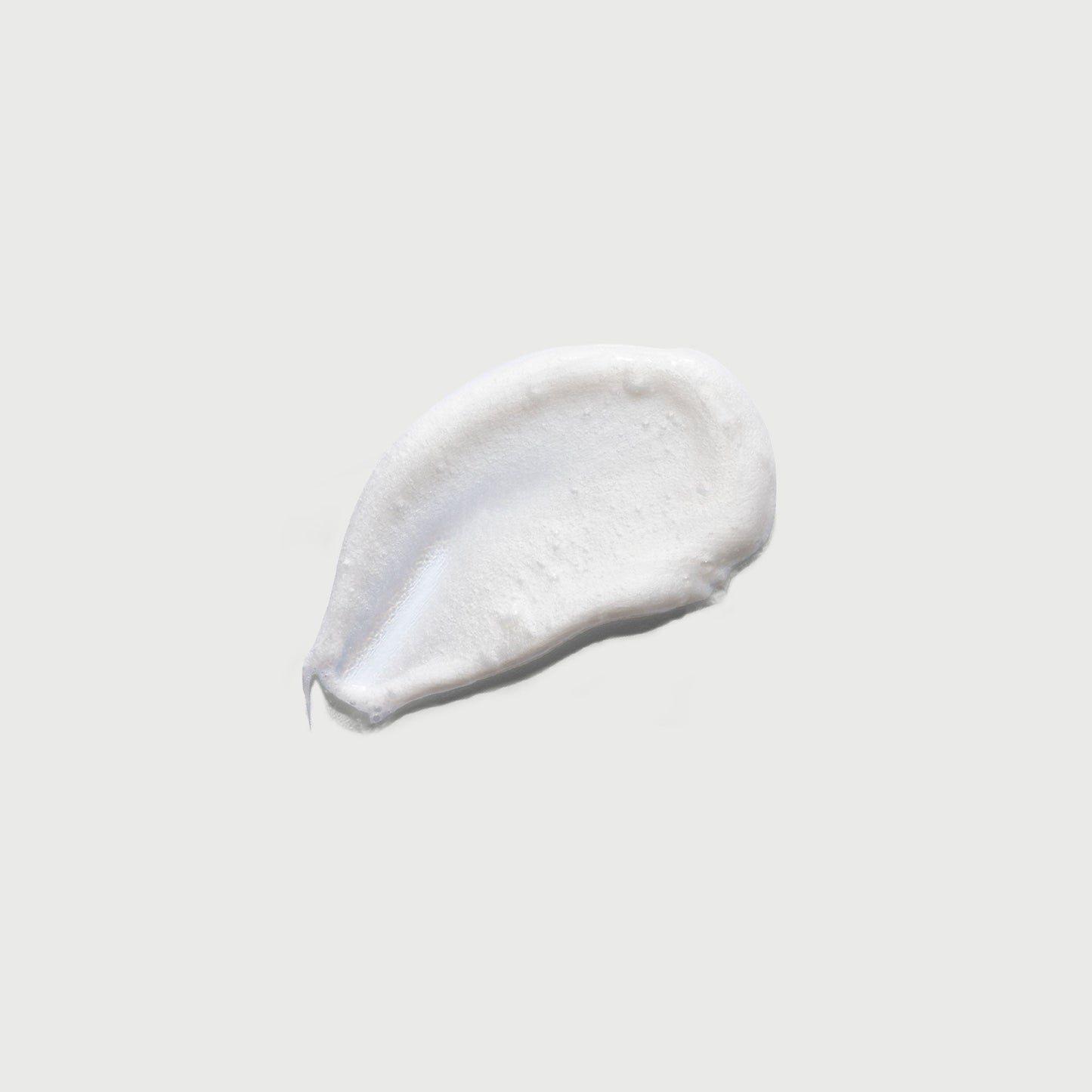 the-smoother-glycolic-acid-exfoliating-body-wash-k9 NATR-40002-Swatch-The-Smoother-Glycolic-Acid-Exfoliating-Body-Wash-bonebkgd.jpg
