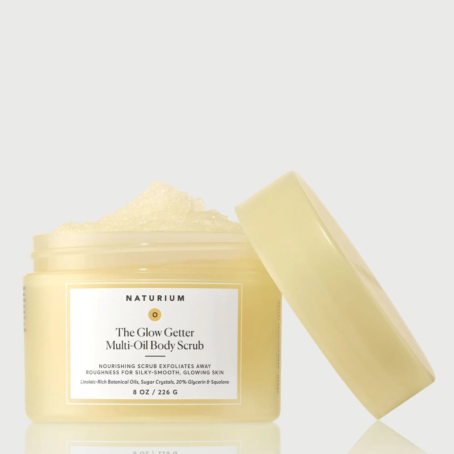 the-glow-getter-multi-oil-body-scrub-n5 NATR-40028-GlowGetter-Multi-Oil-Body-Scrub-Front-CapOff-bonebkgd.webp