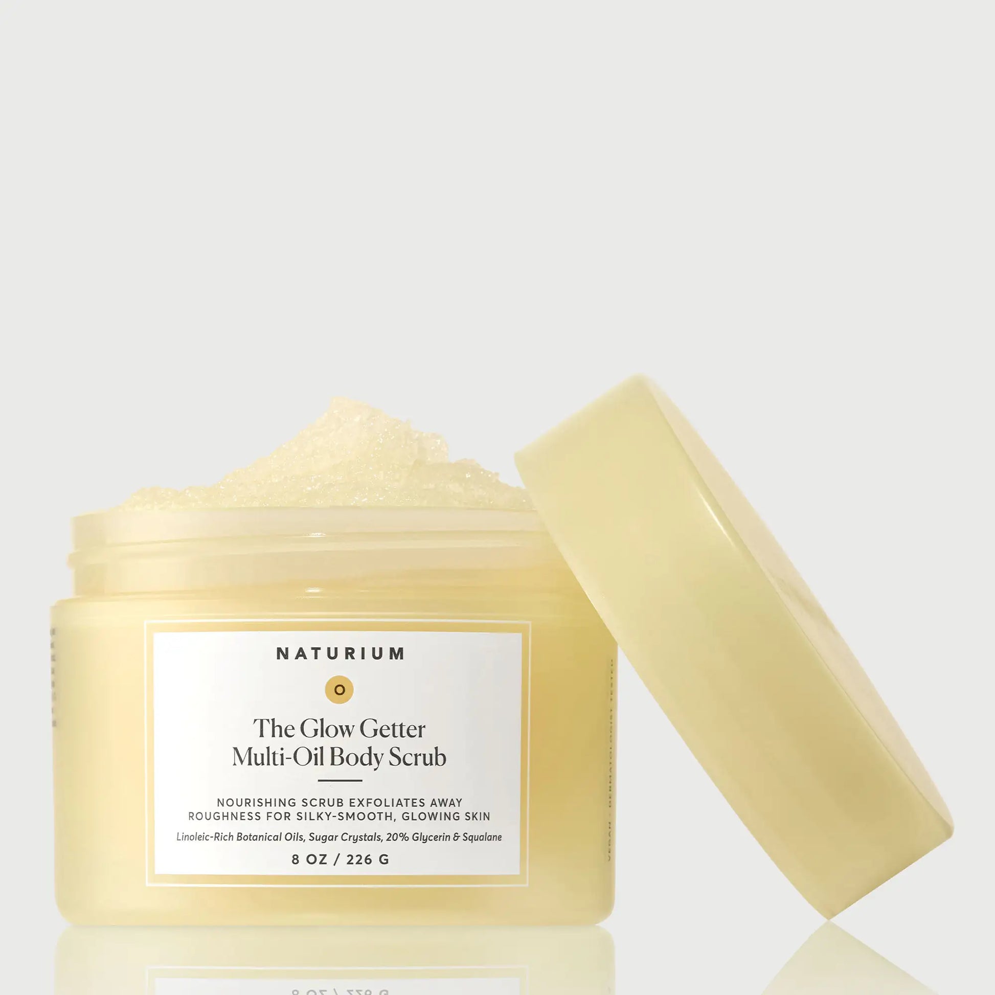 the-glow-getter-multi-oil-body-scrub-n5 NATR-40028-GlowGetter-Multi-Oil-Body-Scrub-Front-CapOff-bonebkgd.webp