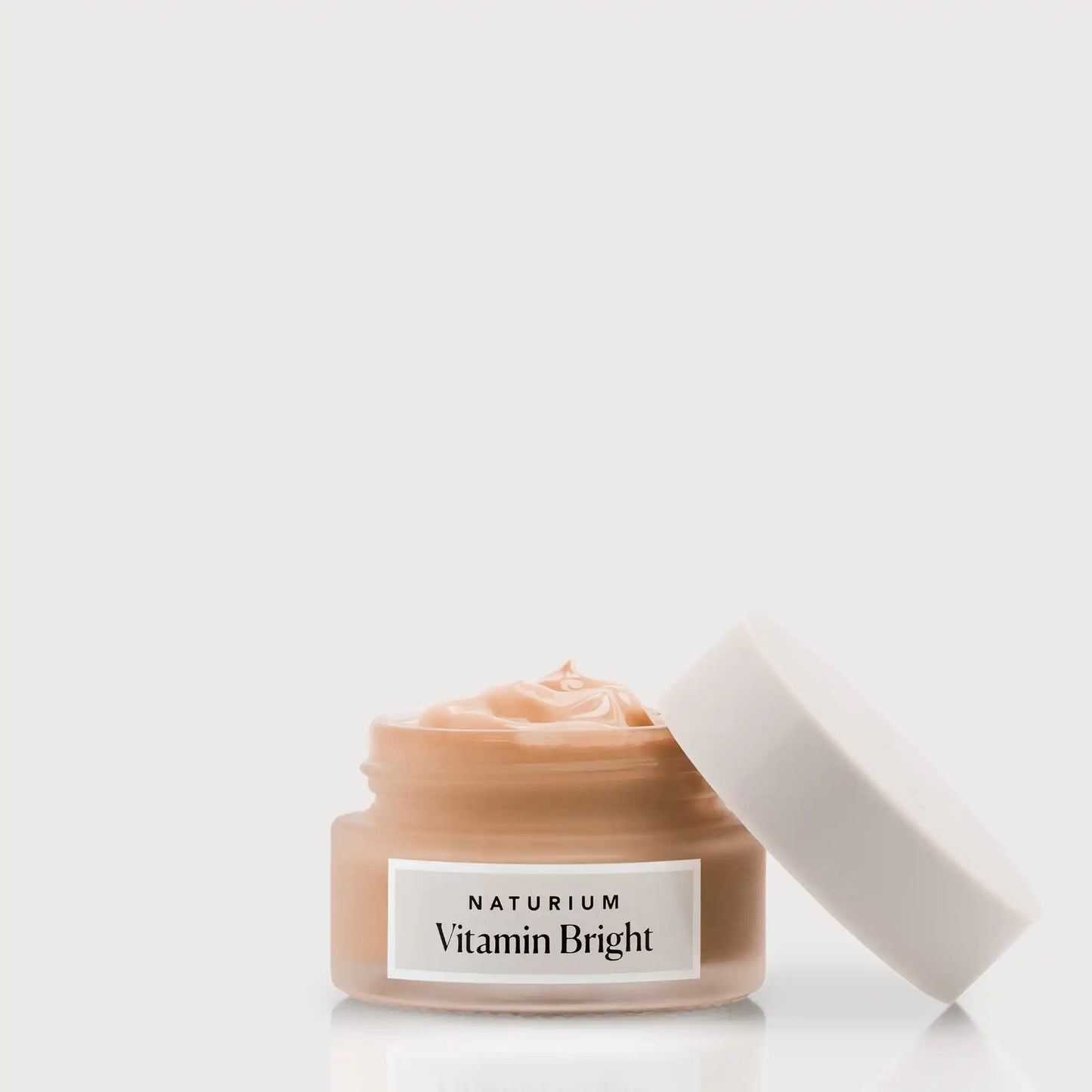 vitamin-bright-illuminating-eye-cream-i1 NATR-VitaminBright_DEEP_Primary_front_openjar_bone.webp